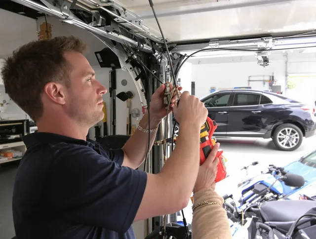 West Hartford Garage Door Repair safety certified technician performing cable replacement in West Hartford