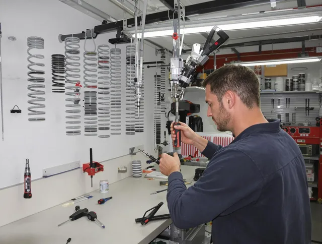 West Hartford Garage Door Repair safety certified technician performing precision spring replacement in West Hartford