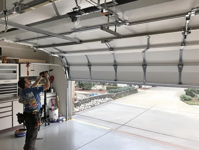 Garage door track repair service by West Hartford Garage Door Repair in West Hartford